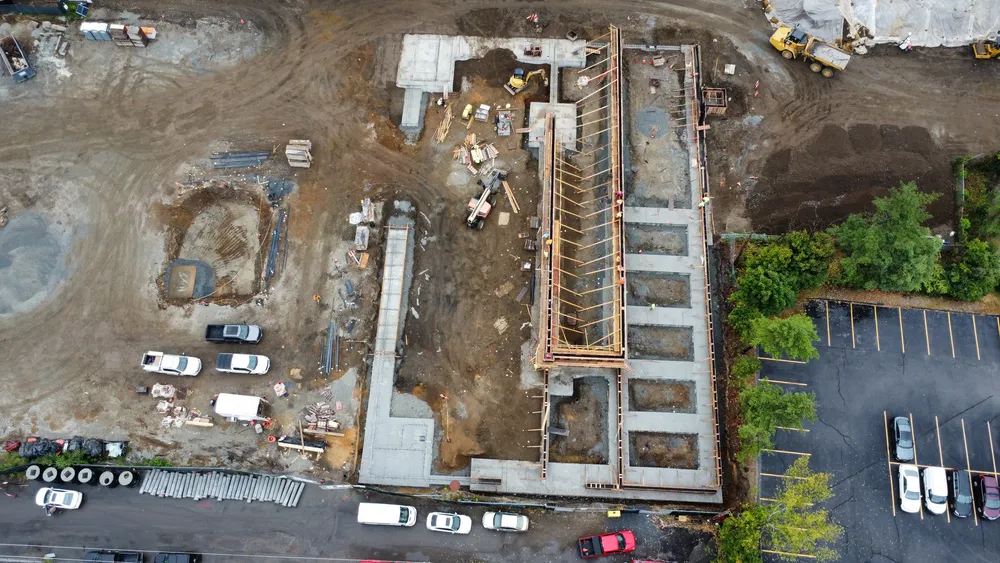 More equipment on site prepping for concrete from Raycon Construction